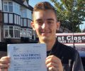 Ben with Driving test pass certificate